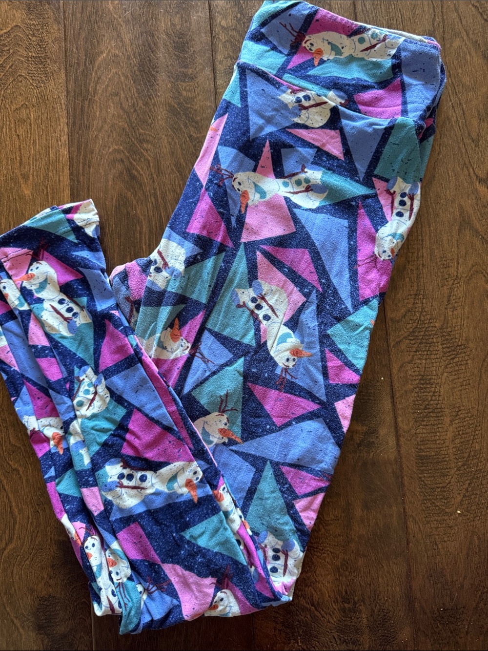 LuLaRoe Purple, Blue and Pink Disney Olaf Triangle Print Leggings
